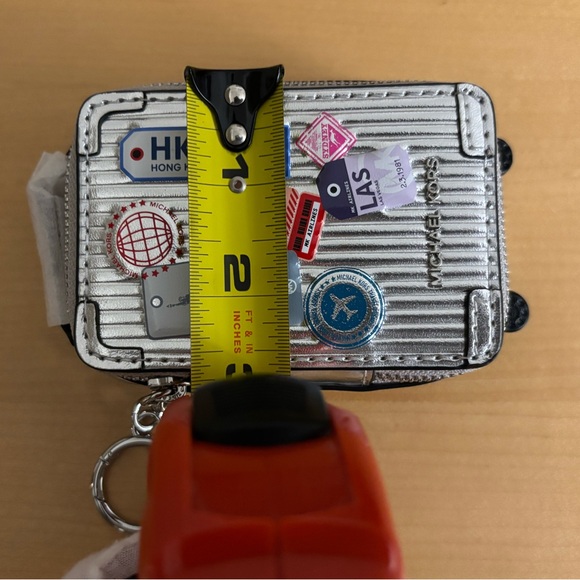 Michael Kors Silver Travel-Themed Trolley Key Fob NWT - Picture 5 of 7